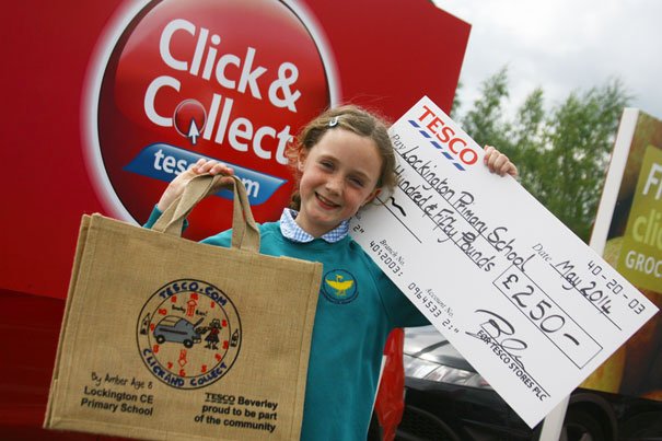 Young Amber Clicks With Tesco And Bags Donation For School