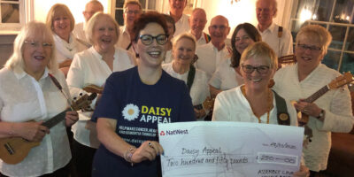 Ukulele Band Making Music To Support The Daisy Appeal